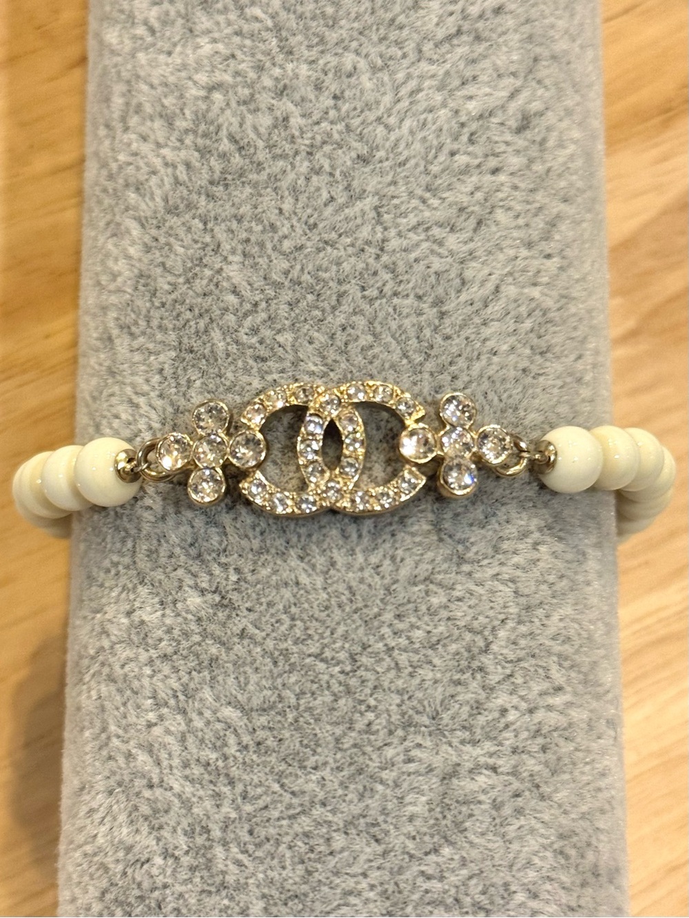 Chanel 2023 Gold/White Crystal & Resin Beads Coco CC Station Bracelet